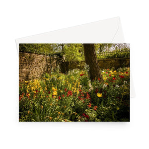 'Walled Garden at Giverny' - A colourful, shady corner in the walled area of Monet's garden at Giverny. In April, the garden is awash with countless varieties of tulip in every direction. High quality greeting card printed on heavyweight 330gsm Fedrigoni card. Supplied with envelope.